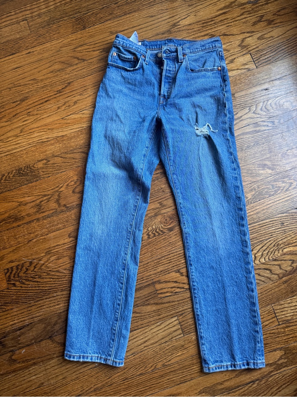 Levi's Light Blue Straight Leg Women's Jeans with Knee Distress